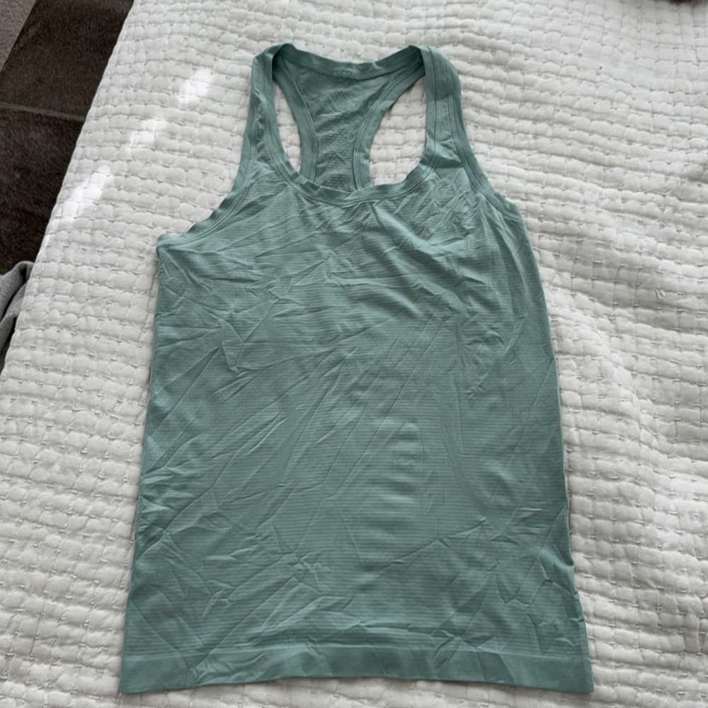 Swiftly Tech Racerback Tank Top 2.0
Hip Length